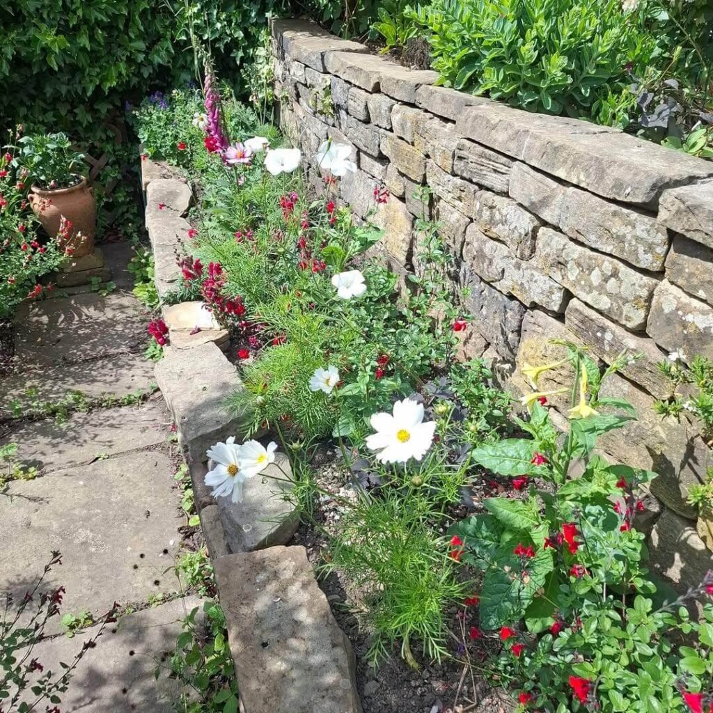 23. Dry-Stone Wall Bed for Rustic English Charm