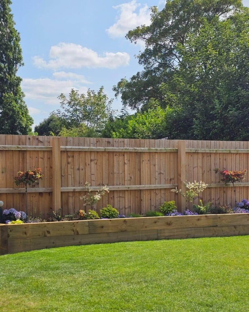 9. Symmetrical Flower Bed for Classic Backyard Charm