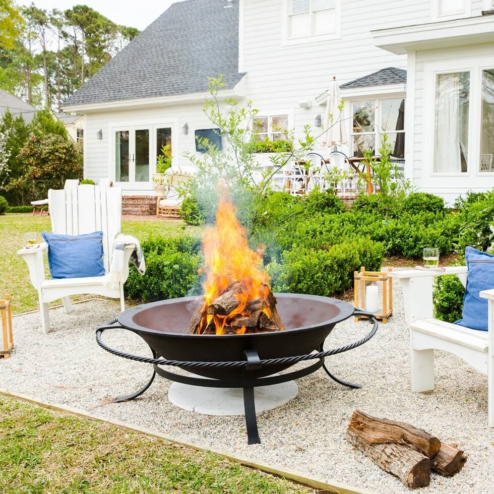  Fire Pit Seating Area Ideas Coastal Farmhouse Vibe with White Adirondacks and Blue Accents