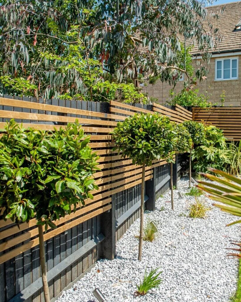 17. Two-Tone Slat Fence for Modern Texture