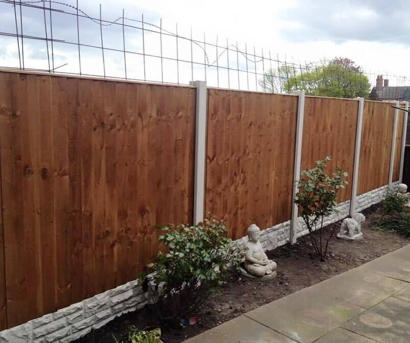 28. Classic Fence with Concrete Base and Decorative Accents