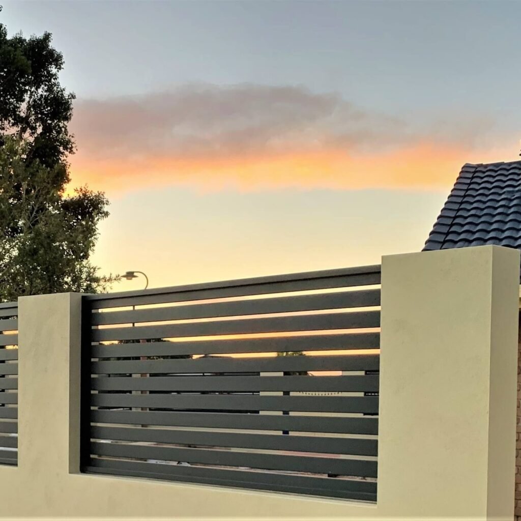 3. Horizontal Slat Fence for Contemporary Appeal