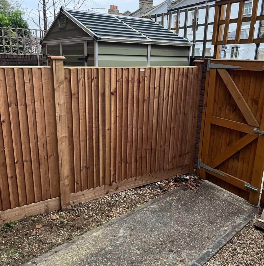 4. Classic Featherboard Fence for Privacy and Security