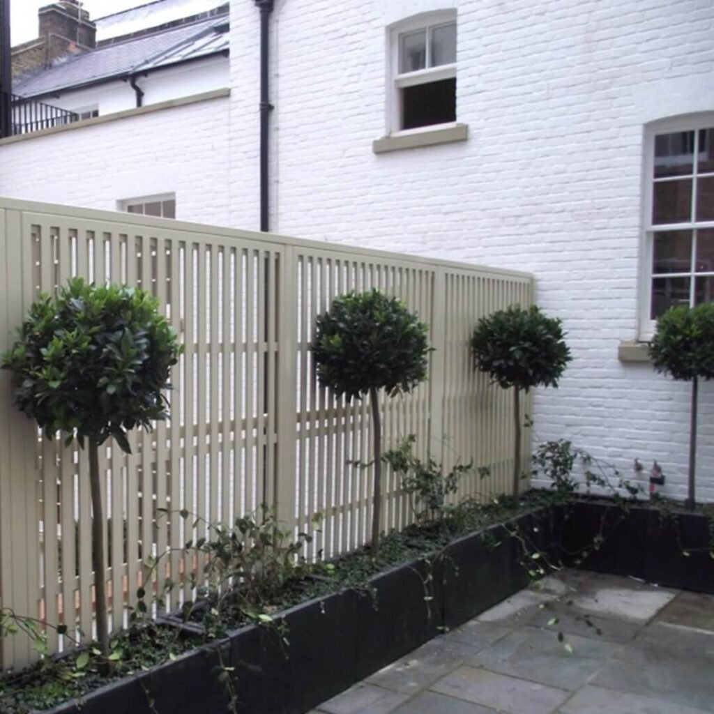 5. Slatted Privacy Fence with Vertical Emphasis