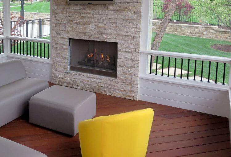Pergola-Covered Porch with Natural Stone Fireplace