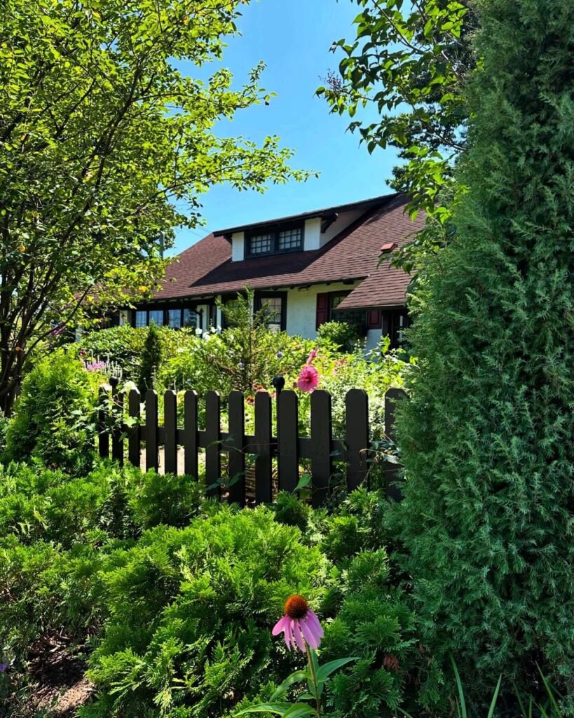 8. Classic Picket Fence for Cottage Garden Charm