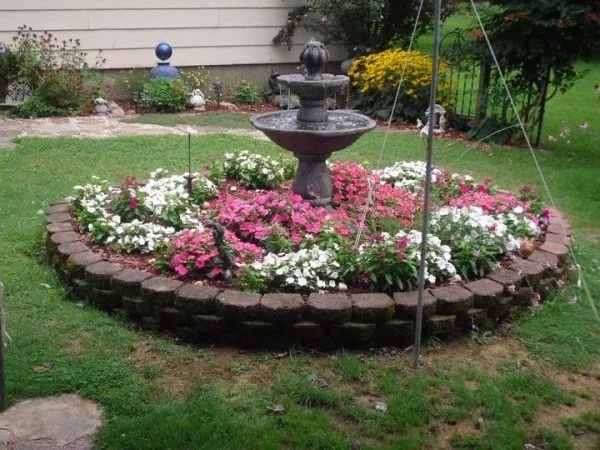 Round Flower Beds Serene Oasis with a Fountain
