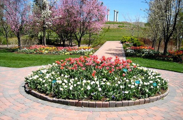 Round Flower Beds Colorful Front Entry