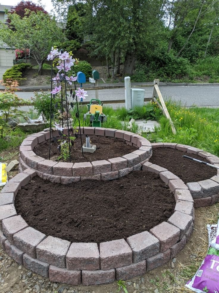 Round Flower Beds Layered Heights for Visual Interest